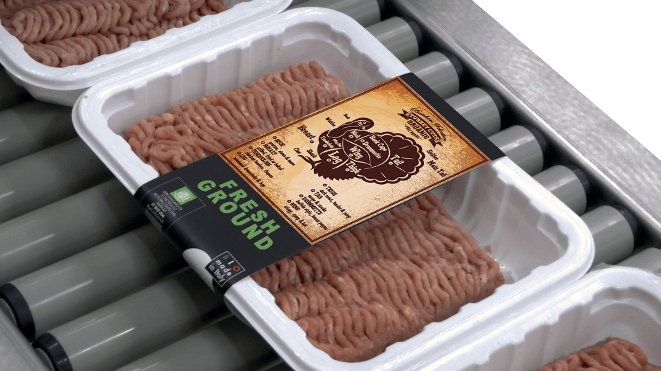 Labeling Meat Trays with Banding