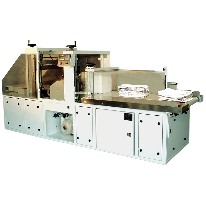 Shrink wrapping machine, automated shrink wrapper, tall profile wrapper, laundry wrapper