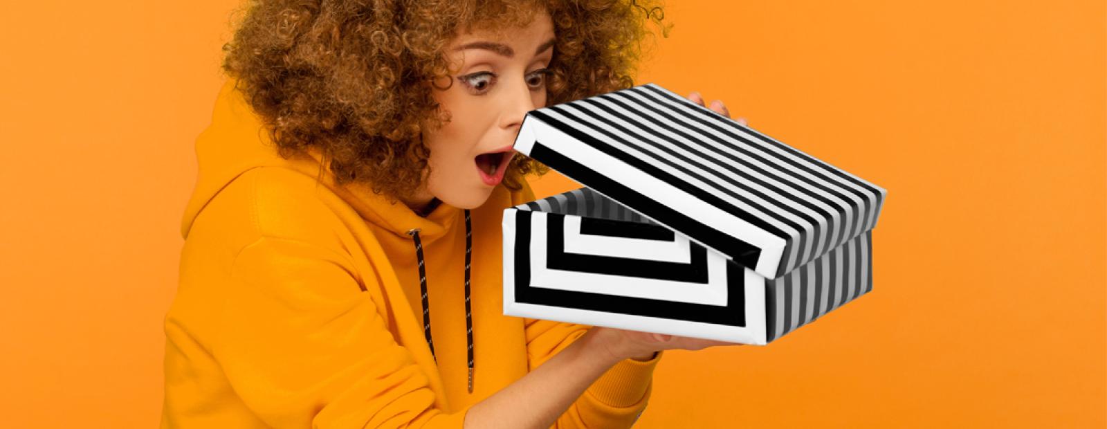 Woman opening box