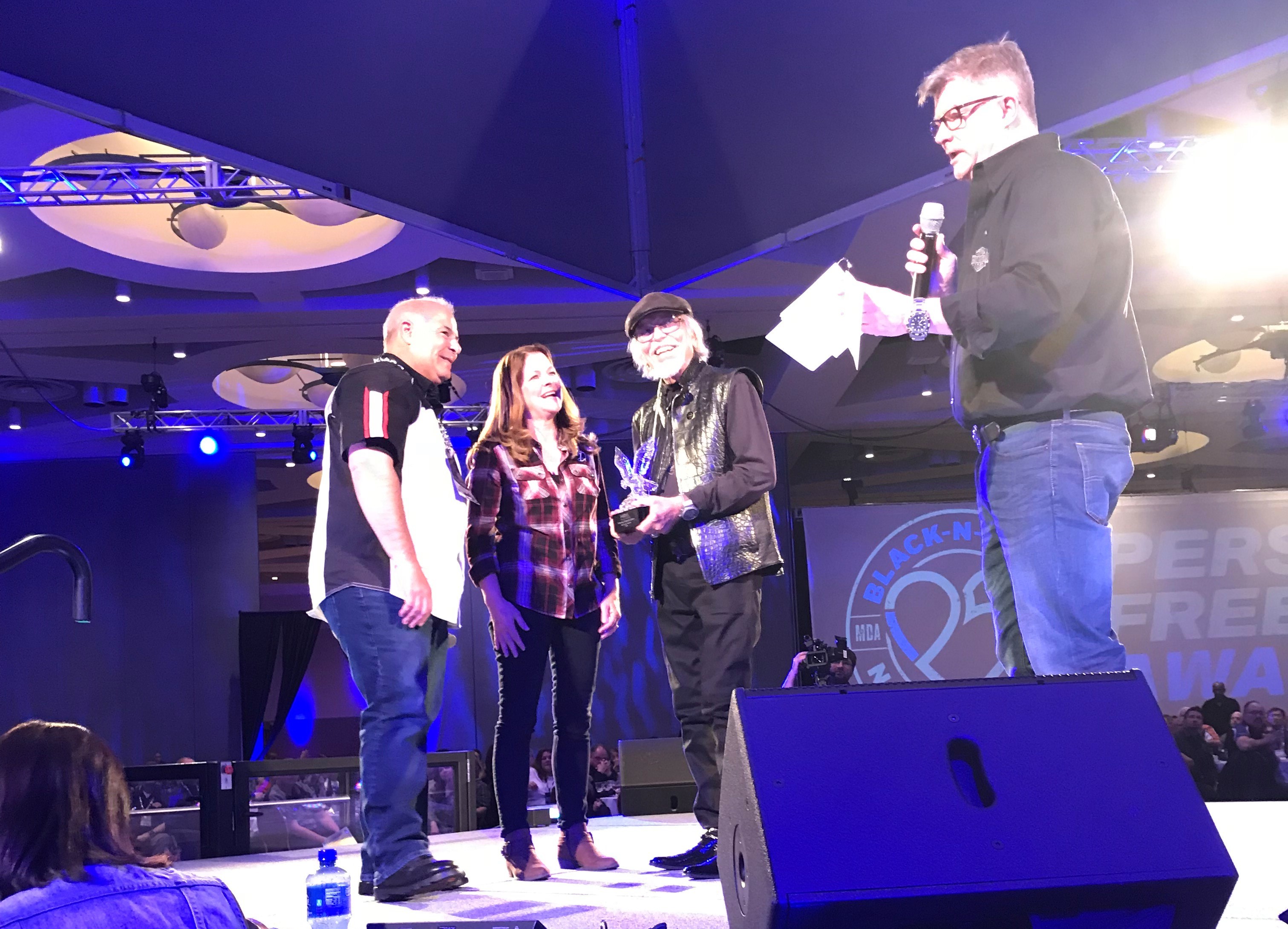 Andrew and Lori Barrieau receive Personal Freedom Award at MDA Black-N-Blue Ball
