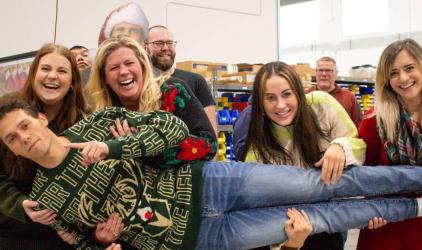 Improving Fun in the Work Place - Felins Packaging Team poses for a fun photo