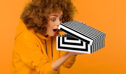 Woman opening box