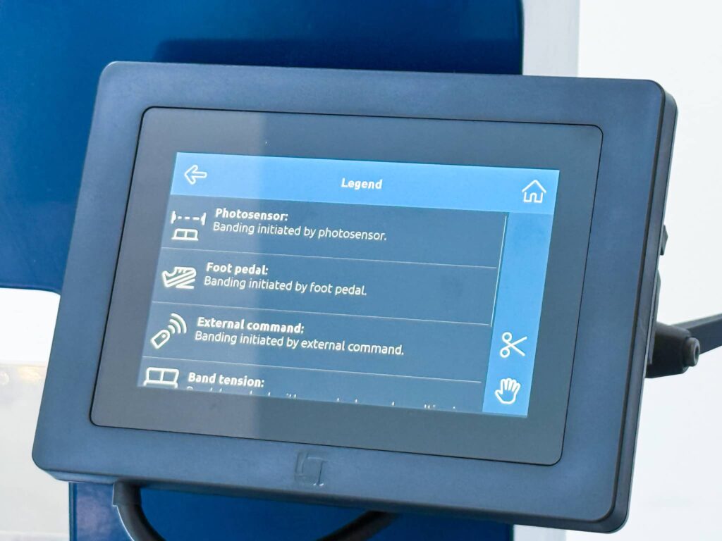 Touchscreen display on the Felins US-3000 showing various banding activation modes including photosensor, foot pedal, and external command.